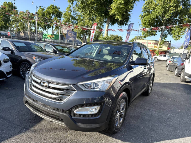 hyundai santa fe 2015 5XYZU3LB1FG294618 image hyundai santa fe 2015 5XYZU3LB1FG294618 image